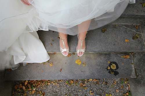shoes woman wearing silver ankle-strap shoes on stairs bride