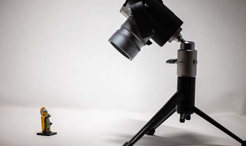 tripod black camera with tripod stand electronics