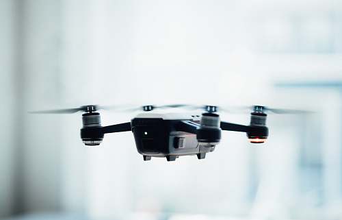 drone black quadcopter drone selective focus photograph fly