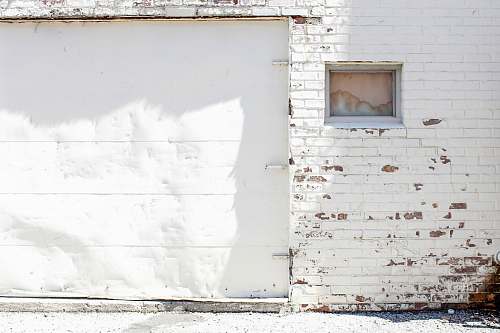 door closes white garage door garage door