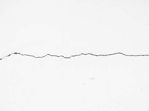 black-and-white crack on surface drawing
