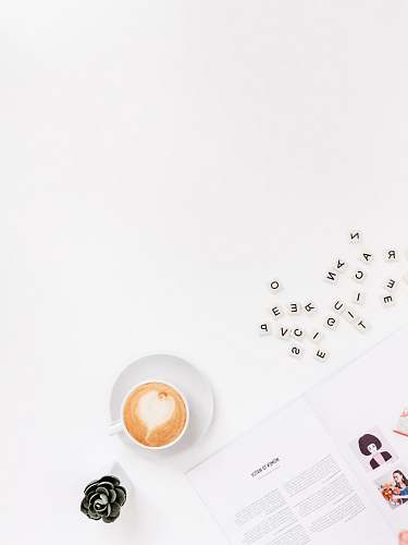 reading flat flay photo of coffee jeffreys bay
