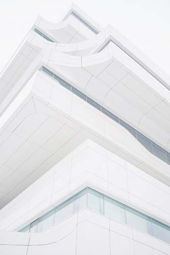 grey low angle photography of building dominion tower