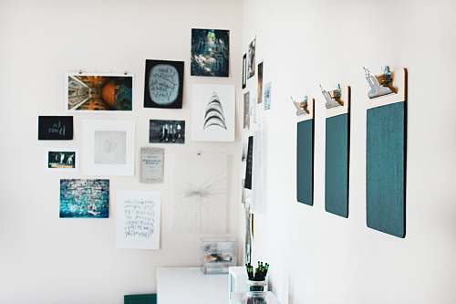 art three green clipboards on wall decor
