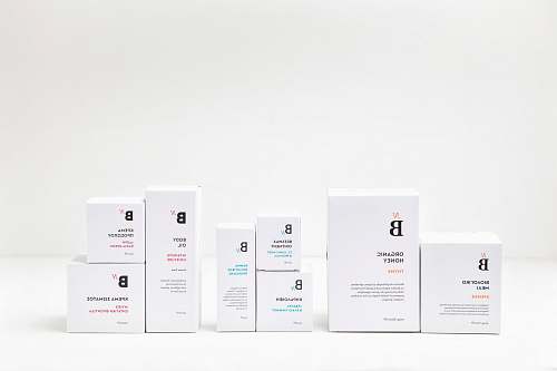 black-and-white white cardboard boxes text