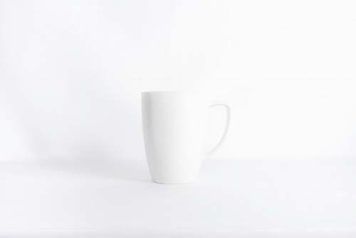 black-and-white white mug against white background grey