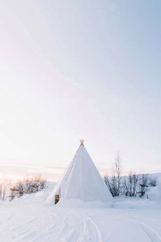 tent white tipi tent covered with snow nature