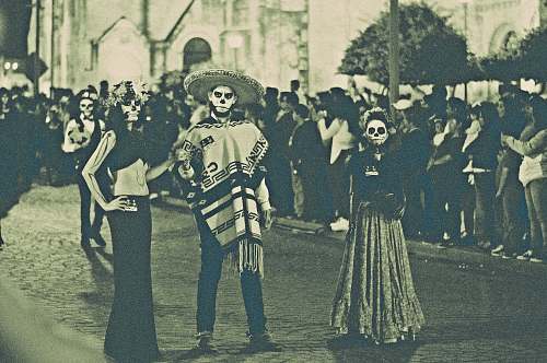 mexico three person standing on street dia de los muertos