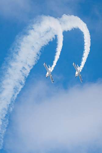 airplane two white airliners under blue sky transportation