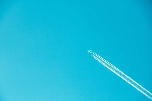 airplane airplane on mid air under clear sky teal