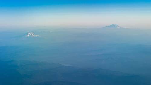 landscape bird's eye view of mountain tip aerial view