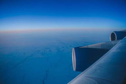 sky blue airplane wing