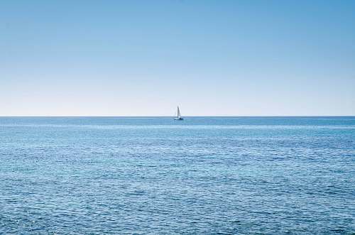boat blue calm body of water transportation