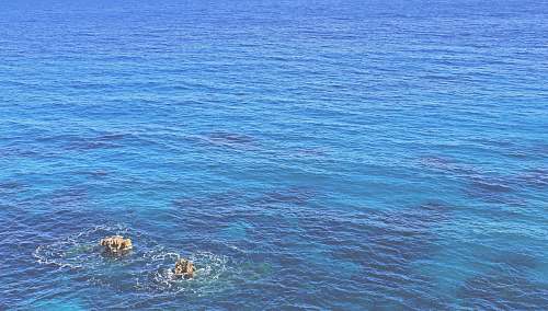 ocean body of water during daytime sea