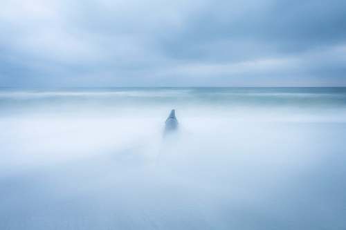 sky body of water fog