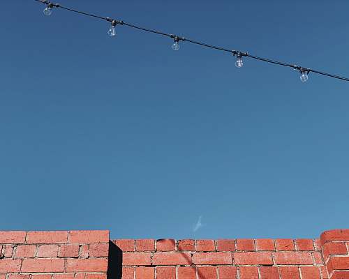 brick brown concrete wall utility pole