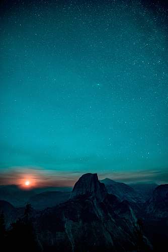 night brown mountain under blue sky yosemite valley
