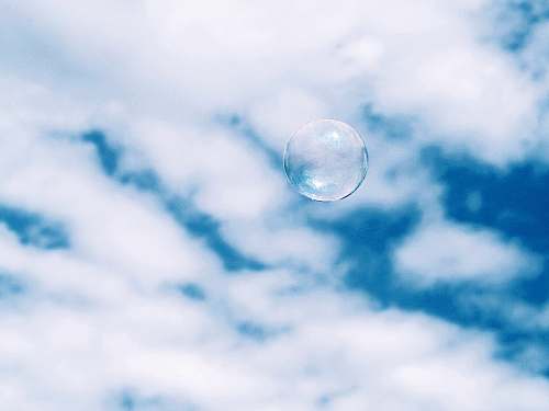 bubble bubble under white clouds at daytime ciutadella park
