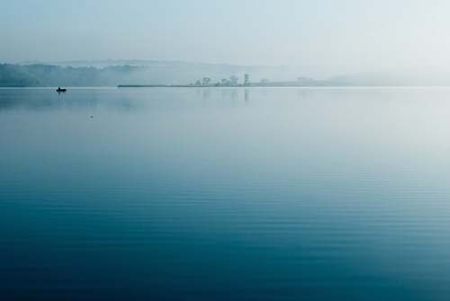 fog clear blue sea under blue sky calm