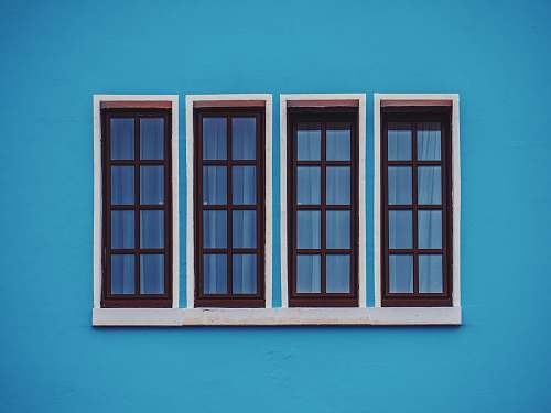 window clear glass windows in blue concrete wall cologne