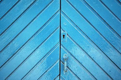 wood closed blue door barcelona