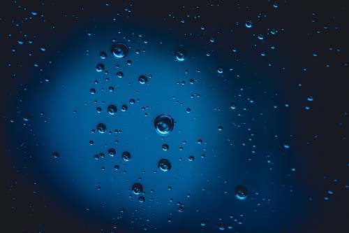 droplet dew photography with blue background teal