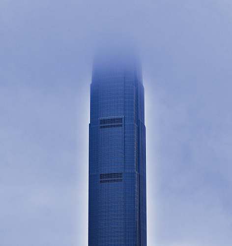 building gray building under gray sky city