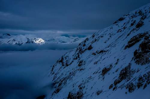 mountain icy mountain during night time nature
