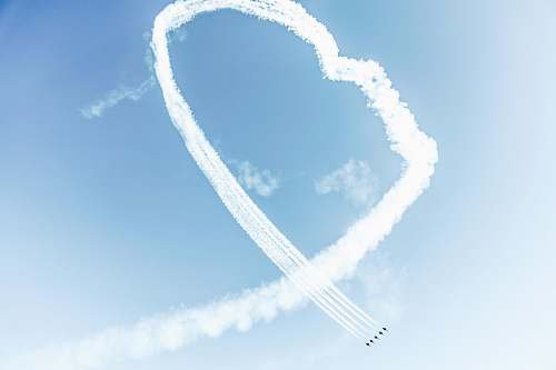 smoke jetplanes on mid air san francisco