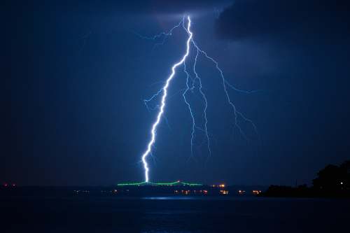 lightning lightning struck on city at night time thunderstorm