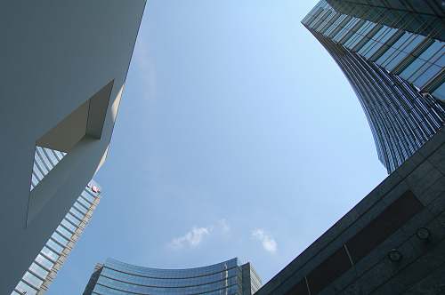 building low angle photo of concrete building office building