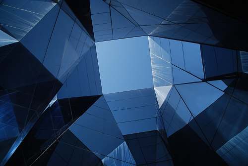 building low angle photo of curtain wall building architecture