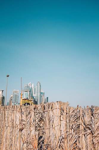 dubai low angle photo of gray concrete building united arab emirates
