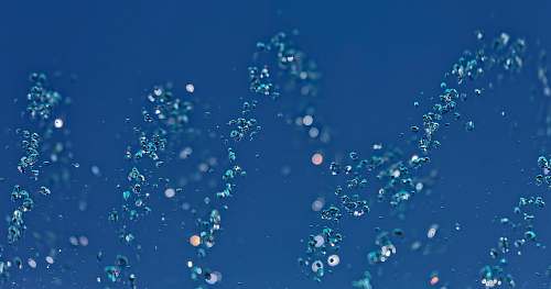 water macro photography of spiraling water background