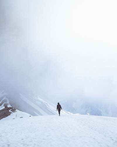 nature man walking on snowfield person