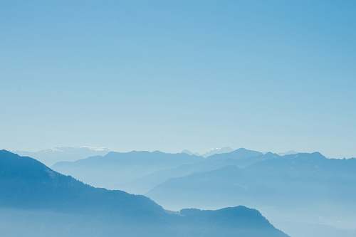 annecy mountain range under clear blue sky france