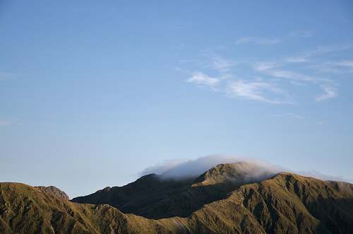 nature photo of gray hills sky