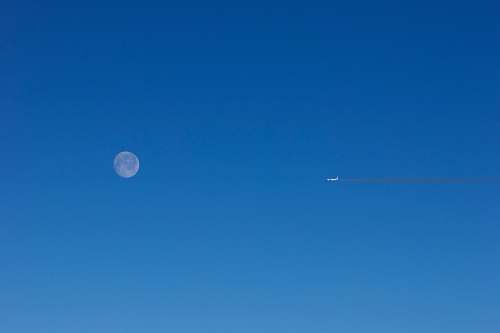 nature plane at flight overlooking full moon outdoors