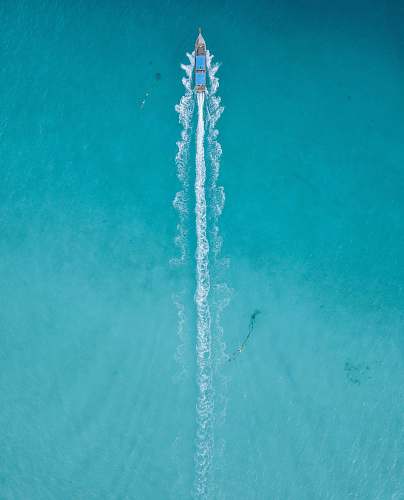 water ship on body of water minimal