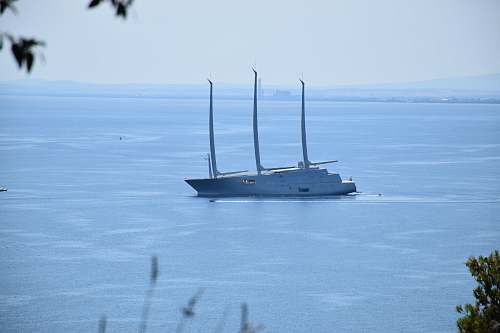 boat ship on calm body of water transportation