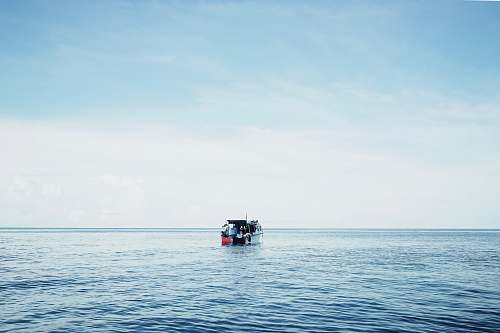 boat white and orange pontoon boat water