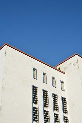 building white concrete building housing