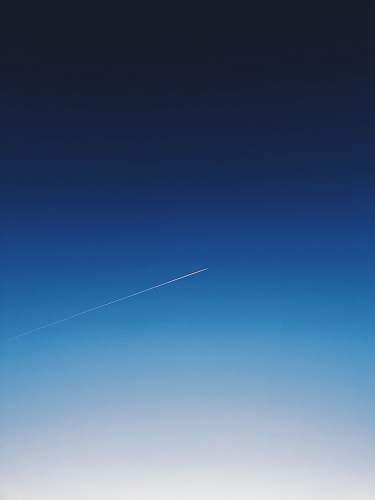 nature white smoke trail in the sky outdoors