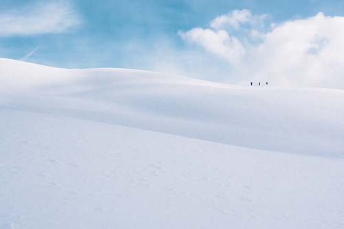 nature white snow covered land under white cloudy sky outdoors