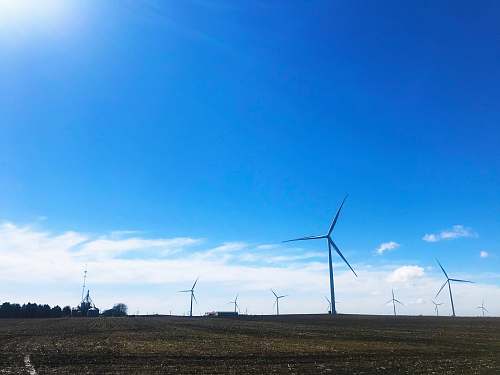 engine wind mills under blue sky motor