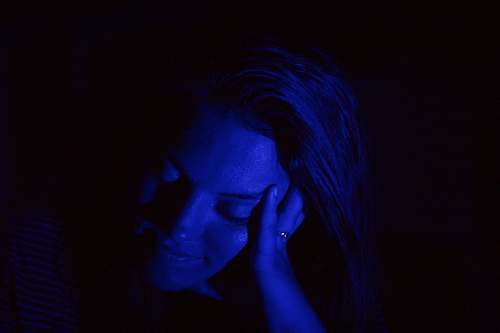 human woman holding her head person