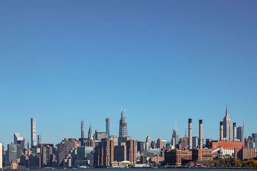 urban panoramic photography of high-rise buildings under clear blue sky building
