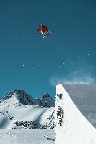 skiing man riding snowboard snow
