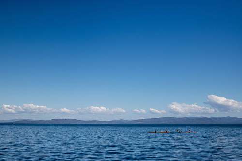 outdoors calm sea water during cloudy day blue