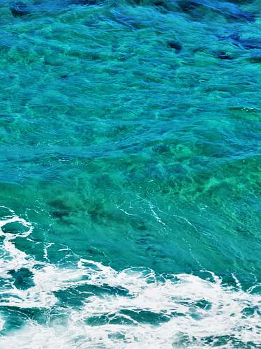 water rippling body of water during daytime ocean